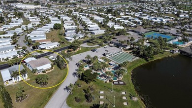 This amazing TRIPLE-wide Palm Harbor home is situated on a on Maple Leaf Golf and Country Club in Florida - for sale on GolfHomes.com, golf home, golf lot