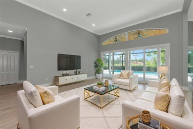 **BRILLIANTLY UPDATED, MOVE-IN READY, GOLF COURSE ESTATE in the on The Oaks Club in Florida - for sale on GolfHomes.com, golf home, golf lot