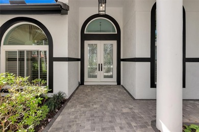**BRILLIANTLY UPDATED, MOVE-IN READY, GOLF COURSE ESTATE in the on The Oaks Club in Florida - for sale on GolfHomes.com, golf home, golf lot