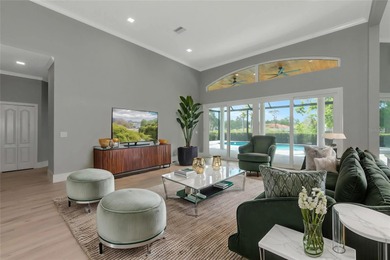 **BRILLIANTLY UPDATED, MOVE-IN READY, GOLF COURSE ESTATE in the on The Oaks Club in Florida - for sale on GolfHomes.com, golf home, golf lot