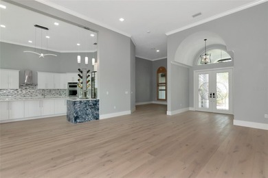 **BRILLIANTLY UPDATED, MOVE-IN READY, GOLF COURSE ESTATE in the on The Oaks Club in Florida - for sale on GolfHomes.com, golf home, golf lot
