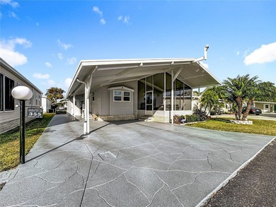 Welcome to this beautifully updated, tastefully decorated home on Lily Lake Golf and RV Resort in Florida - for sale on GolfHomes.com, golf home, golf lot