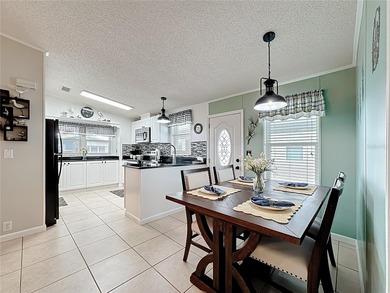 Welcome to this beautifully updated, tastefully decorated home on Lily Lake Golf and RV Resort in Florida - for sale on GolfHomes.com, golf home, golf lot