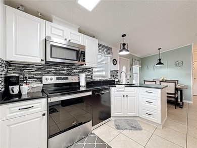 Welcome to this beautifully updated, tastefully decorated home on Lily Lake Golf and RV Resort in Florida - for sale on GolfHomes.com, golf home, golf lot