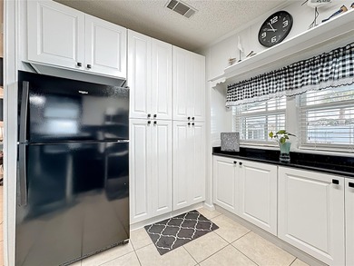 Welcome to this beautifully updated, tastefully decorated home on Lily Lake Golf and RV Resort in Florida - for sale on GolfHomes.com, golf home, golf lot