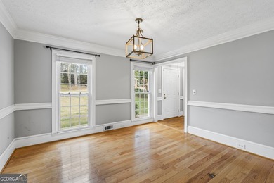 This 4 bedroom, 2.5 bath single family home is located in a well on Honey Creek Country Club in Georgia - for sale on GolfHomes.com, golf home, golf lot