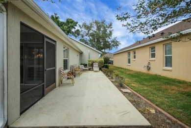 Highly desirable Block/Stucco 3/2 with 2 car + golf cart garage on The Links of Spruce Creek in Florida - for sale on GolfHomes.com, golf home, golf lot
