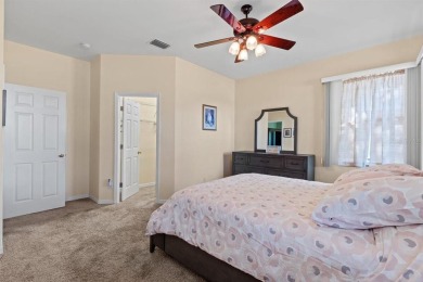 Welcome to this charming three-bedroom, two-bathroom home with a on Deep Creek Golf Club in Florida - for sale on GolfHomes.com, golf home, golf lot