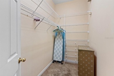 Welcome to this charming three-bedroom, two-bathroom home with a on Deep Creek Golf Club in Florida - for sale on GolfHomes.com, golf home, golf lot