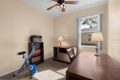 Welcome to this charming three-bedroom, two-bathroom home with a on Deep Creek Golf Club in Florida - for sale on GolfHomes.com, golf home, golf lot
