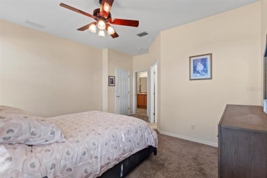 Welcome to this charming three-bedroom, two-bathroom home with a on Deep Creek Golf Club in Florida - for sale on GolfHomes.com, golf home, golf lot