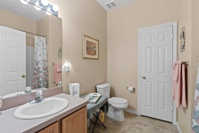 Welcome to this charming three-bedroom, two-bathroom home with a on Deep Creek Golf Club in Florida - for sale on GolfHomes.com, golf home, golf lot