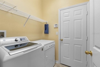Welcome to this charming three-bedroom, two-bathroom home with a on Deep Creek Golf Club in Florida - for sale on GolfHomes.com, golf home, golf lot