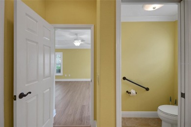 Highly desirable Block/Stucco 3/2 with 2 car + golf cart garage on The Links of Spruce Creek in Florida - for sale on GolfHomes.com, golf home, golf lot
