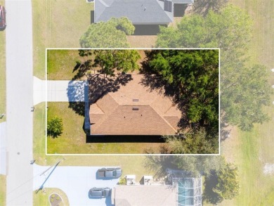 Welcome to this charming three-bedroom, two-bathroom home with a on Deep Creek Golf Club in Florida - for sale on GolfHomes.com, golf home, golf lot
