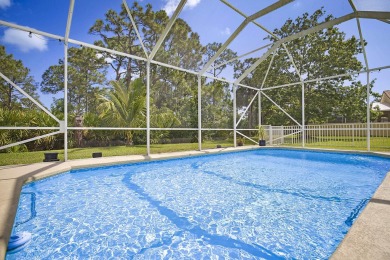Pristine CBS POOL home with 3/4 bedrooms, 2 bath, 2 car garage on Champions Club at Summerfield in Florida - for sale on GolfHomes.com, golf home, golf lot