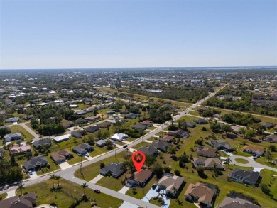 Welcome to this charming three-bedroom, two-bathroom home with a on Deep Creek Golf Club in Florida - for sale on GolfHomes.com, golf home, golf lot