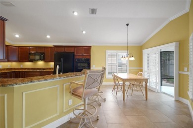 Highly desirable Block/Stucco 3/2 with 2 car + golf cart garage on The Links of Spruce Creek in Florida - for sale on GolfHomes.com, golf home, golf lot