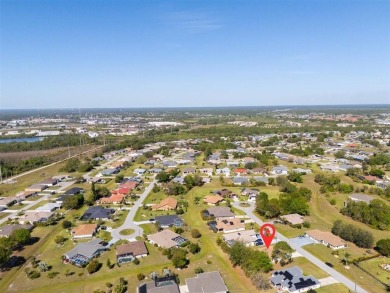Welcome to this charming three-bedroom, two-bathroom home with a on Deep Creek Golf Club in Florida - for sale on GolfHomes.com, golf home, golf lot