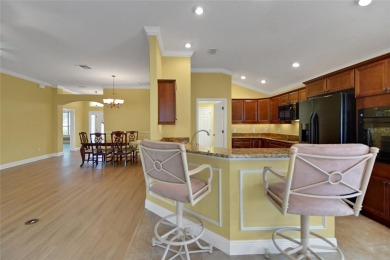 Highly desirable Block/Stucco 3/2 with 2 car + golf cart garage on The Links of Spruce Creek in Florida - for sale on GolfHomes.com, golf home, golf lot