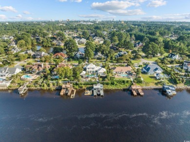 Discover luxury living along the scenic Intracoastal Waterway in on Myrtlewood Golf Course and Club  in South Carolina - for sale on GolfHomes.com, golf home, golf lot