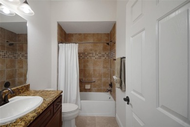Highly desirable Block/Stucco 3/2 with 2 car + golf cart garage on The Links of Spruce Creek in Florida - for sale on GolfHomes.com, golf home, golf lot