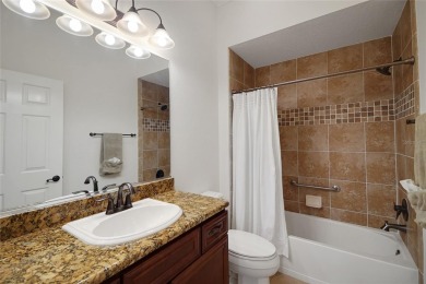 Highly desirable Block/Stucco 3/2 with 2 car + golf cart garage on The Links of Spruce Creek in Florida - for sale on GolfHomes.com, golf home, golf lot
