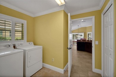Highly desirable Block/Stucco 3/2 with 2 car + golf cart garage on The Links of Spruce Creek in Florida - for sale on GolfHomes.com, golf home, golf lot