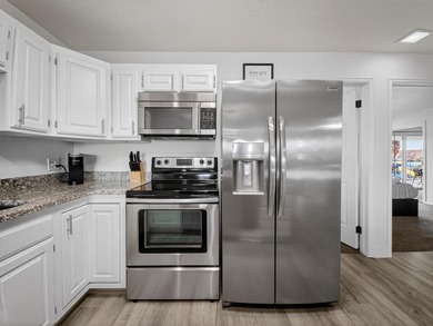 Welcome to Las Palmas Resort where this top-floor condo stands on Sunbrook Golf Course in Utah - for sale on GolfHomes.com, golf home, golf lot