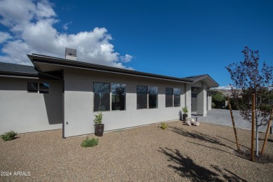 This elegant 3-bedroom, 2-bath home with a 2-car garage and a on Antelope Hills Golf Courses in Arizona - for sale on GolfHomes.com, golf home, golf lot