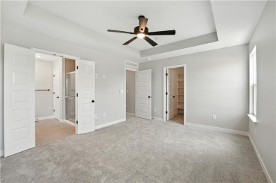Welcome to this charming 4-bedroom, 3.5-bathroom two-story home on Golf Club of Creekmoor in Missouri - for sale on GolfHomes.com, golf home, golf lot
