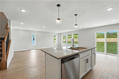 Welcome to this charming 4-bedroom, 3.5-bathroom two-story home on Golf Club of Creekmoor in Missouri - for sale on GolfHomes.com, golf home, golf lot