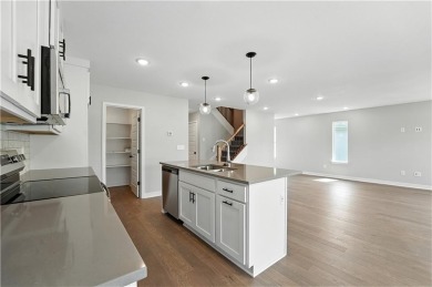 Welcome to this charming 4-bedroom, 3.5-bathroom two-story home on Golf Club of Creekmoor in Missouri - for sale on GolfHomes.com, golf home, golf lot