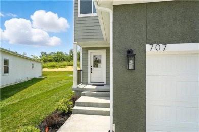 Welcome to this charming 4-bedroom, 3.5-bathroom two-story home on Golf Club of Creekmoor in Missouri - for sale on GolfHomes.com, golf home, golf lot