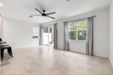 Beautifully maintained END-UNIT townhouse in a GATED community on Heritage Ridge Golf Club in Florida - for sale on GolfHomes.com, golf home, golf lot