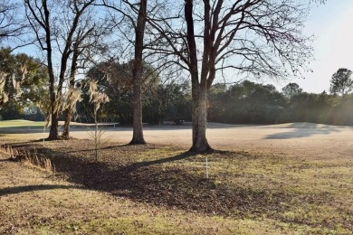 Golf Course site with gorgeous sunsets, and surrounded by on Players Course At Wyboo Plantation in South Carolina - for sale on GolfHomes.com, golf home, golf lot