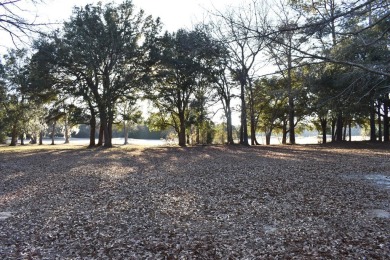 Golf Course site with gorgeous sunsets, and surrounded by on Players Course At Wyboo Plantation in South Carolina - for sale on GolfHomes.com, golf home, golf lot
