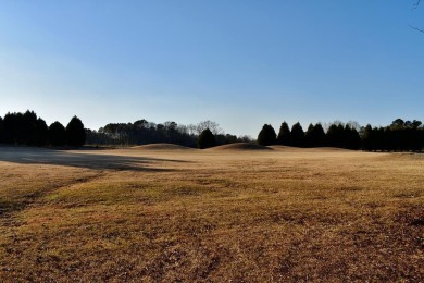 Golf Course site with gorgeous sunsets, and surrounded by on Players Course At Wyboo Plantation in South Carolina - for sale on GolfHomes.com, golf home, golf lot
