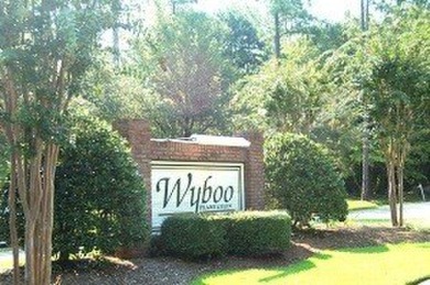 Golf Course site with gorgeous sunsets, and surrounded by on Players Course At Wyboo Plantation in South Carolina - for sale on GolfHomes.com, golf home, golf lot