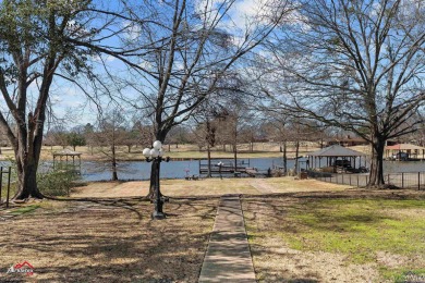 Timeless waterfront beauty in Emerald Bay on Lake Palestine! on Emerald Bay Club in Texas - for sale on GolfHomes.com, golf home, golf lot