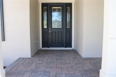 This stunning and luxurious new home by Spire Homes, a on Southern Hills Plantation Club in Florida - for sale on GolfHomes.com, golf home, golf lot