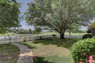Exceptional golf course home with pond views on # 7 fairway of on White Bluff Resort - New Course in Texas - for sale on GolfHomes.com, golf home, golf lot
