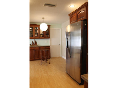 Welcome to this beautifully maintained Eden home with 1598 sq ft on Mainlands Golf Club in Florida - for sale on GolfHomes.com, golf home, golf lot