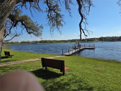 Exceptional golf course home with pond views on # 7 fairway of on White Bluff Resort - New Course in Texas - for sale on GolfHomes.com, golf home, golf lot