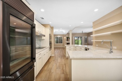 Effortless Sophistication in the Heart of Gainey Ranch

Perched on Gainey Ranch Golf Club in Arizona - for sale on GolfHomes.com, golf home, golf lot