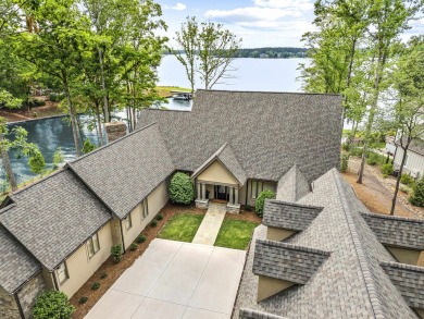 OUTSTANDING PANORAMIC VIEWS - 6BR/6.5BA LAKEFRONT HOME IN on Great Waters Course At Reynolds Plantation in Georgia - for sale on GolfHomes.com, golf home, golf lot