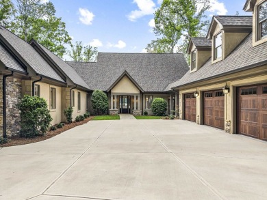 OUTSTANDING PANORAMIC VIEWS - 6BR/6.5BA LAKEFRONT HOME IN on Great Waters Course At Reynolds Plantation in Georgia - for sale on GolfHomes.com, golf home, golf lot