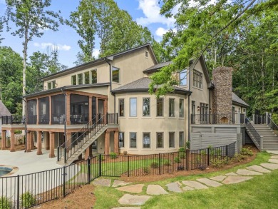 OUTSTANDING PANORAMIC VIEWS - 6BR/6.5BA LAKEFRONT HOME IN on Great Waters Course At Reynolds Plantation in Georgia - for sale on GolfHomes.com, golf home, golf lot