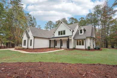 Home is ready to close now. $10,000 closing cost incentive for on Harbor Club Golf and Country Club in Georgia - for sale on GolfHomes.com, golf home, golf lot