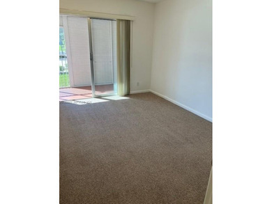 CHARMING 2BR 1.5 BA APARTMENT WITH RELAXING POOL & GARDEN VIEW on Flamingo Lakes Country Club in Florida - for sale on GolfHomes.com, golf home, golf lot